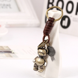 Hand and foot movable cartoon cowhide keychain retro woven leather car keychain small gift