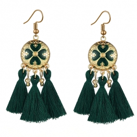 European and american retro creative earrings disc tassel earrings female fashion personality dripping four-leaf clover hand-woven earrings