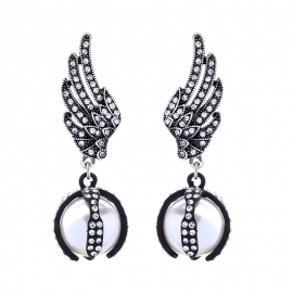 Vintage crystal pearl wings earrings personality european and american fashion trend wild earrings