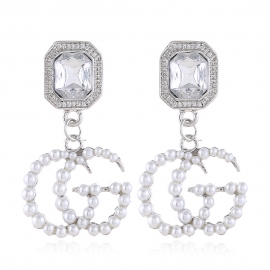 Letter gg earrings korean fashion creative personality new geometric alloy gemstone pearl earrings factory direct sales
