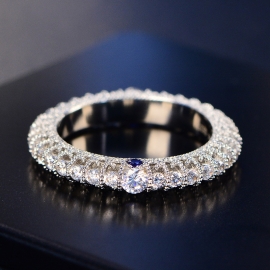Female ring full of diamonds beautifully carved with sapphires
