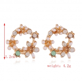 Korean version of dongdaemun creative fashion new super fairy earrings alloy earrings round flower earrings female