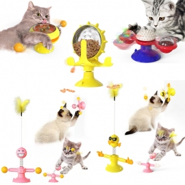 Cat spins windmill toy
